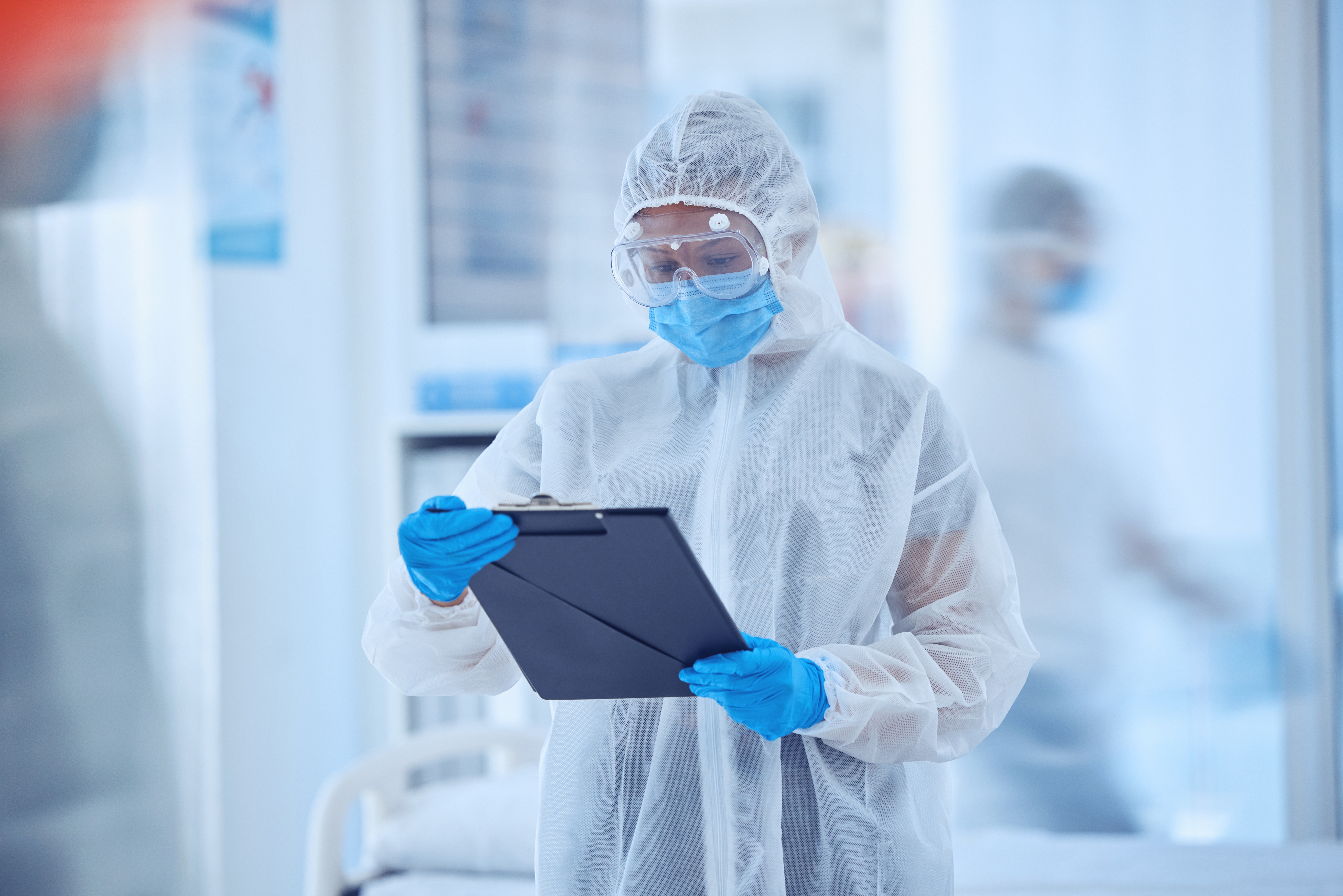 nurse with protective gear on