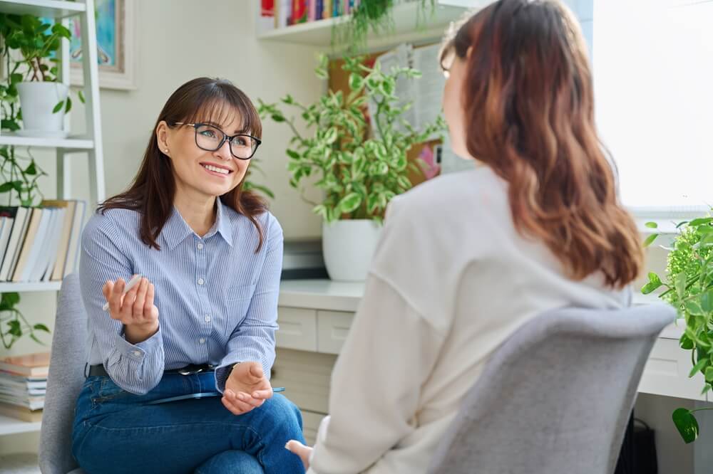 social worker with a client