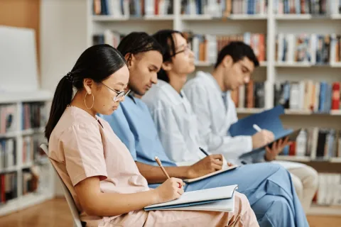 nursing students taking notes